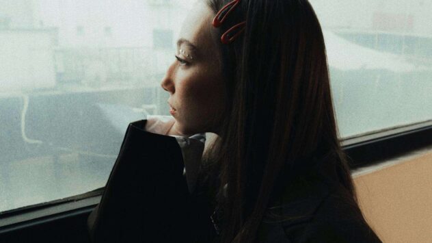 Maladaptive Daydreaming Woman by Window